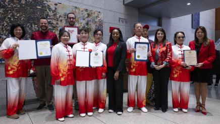 Asm. Stefani with guests giving certificates at the Lunar New Year Event
