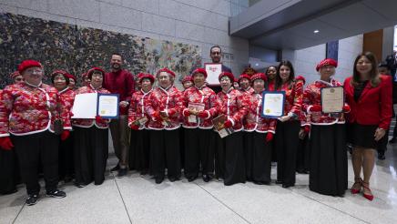 Asm. Stefani with guests giving certificates at the Lunar New Year Event