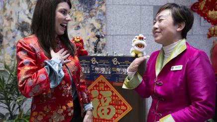 Asm. Stefani speaking with guest at the Lunar New Year Event