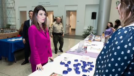 Asm. Stefani DV Awareness Event Photo with guests