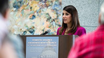 Asm. Stefani speaking DV Awareness Event Photo