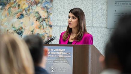 Asm. Stefani speaking DV Awareness Event Photo